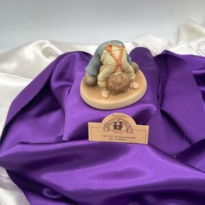 Enesco Figurine “I’m Not as Backwards As I Looks” Signed.